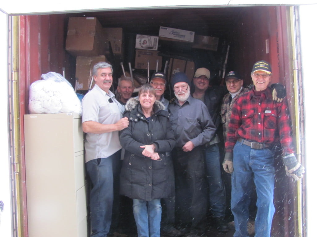 MEMO volunteers finish packing 55th container in a snow storm