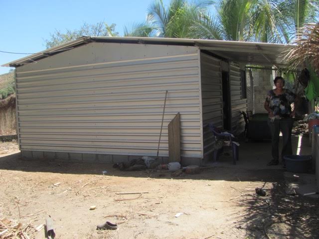 ONE OF EIGHT HOUSES BUILT THIS JANUARY BY AN EFCCM TEAM FROM ALBERTA. THE FAMILIES HAVE LITTLE FURNITURE SO MEMO IS ATTEMPTING TO SEND A FEW BASIC ITEMS LIKE CHAIRS,KITCHEN TABLE AND HOSPITAL MATTRESSES THAT CAN BE USED ON THE FLOOR.